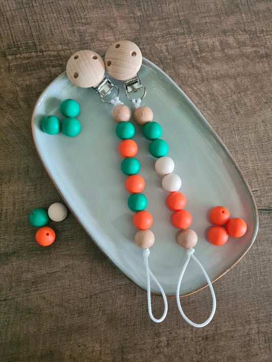 Cute handmade soother clip. Unique gift ideas for newborns and toddlers. Handcrafted Irish made. Colour of Ireland flag. Irish flag colour. Creative Irish Gifts. Good homemade gifts. Gift of craft. Cute handmade gift ideas. Simple handmade gifts.