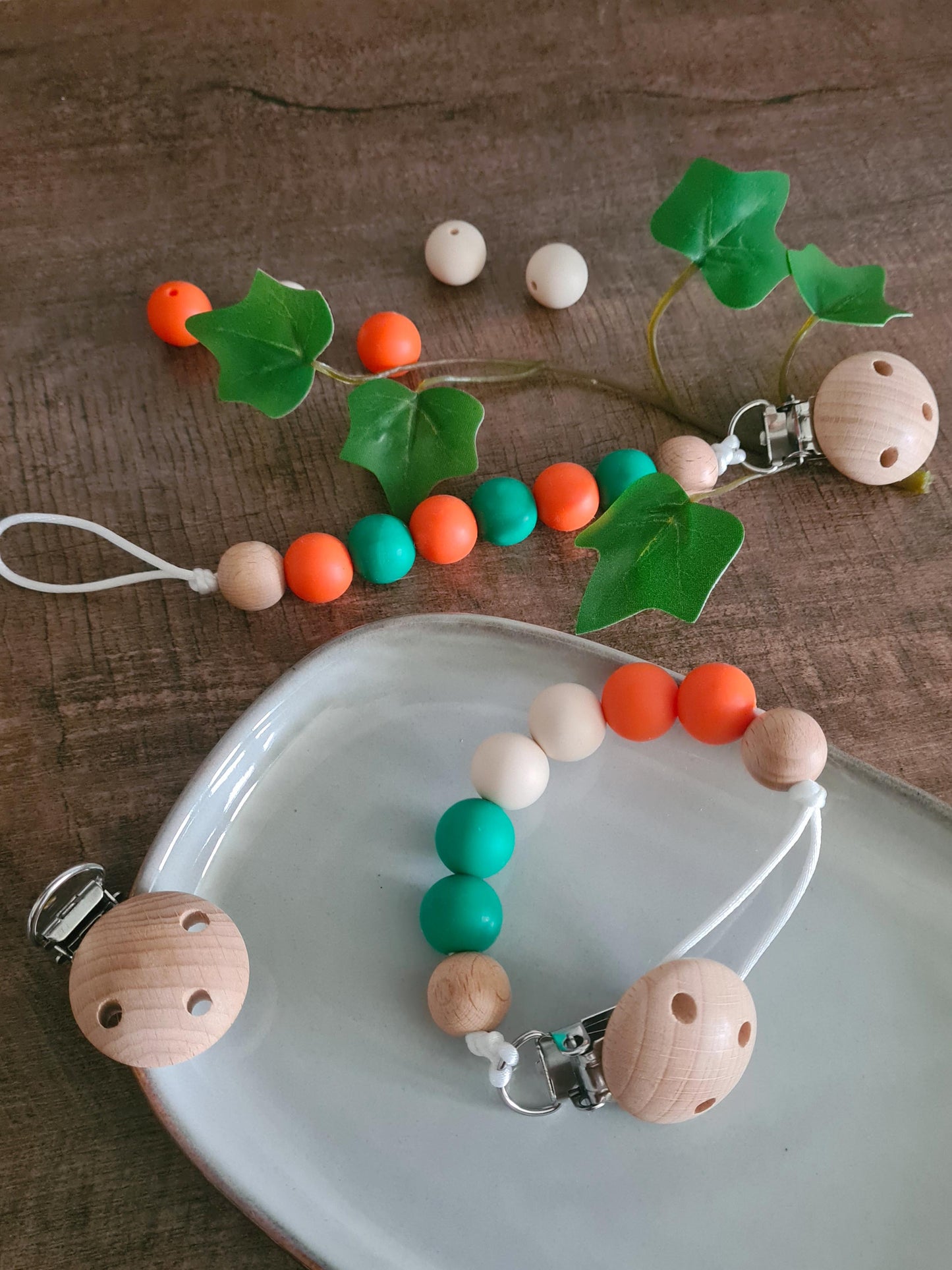 Cute handmade soother clips that display the colours of the Irish flag. A unique present for the newborns and toddlers of Ireland! 