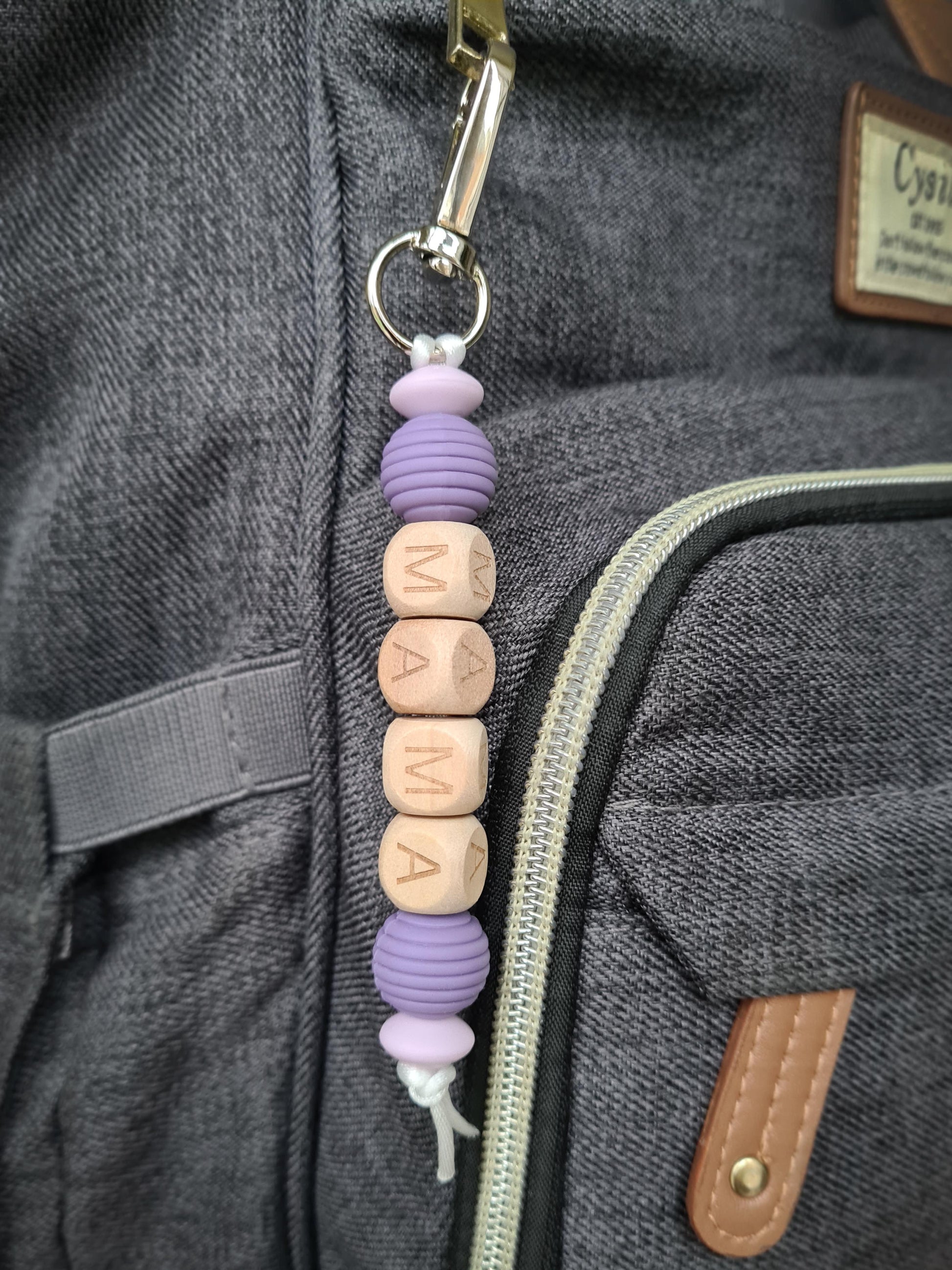 Hey Mama! Treat yo self to our unique handmade keychain / zip puller. Our keychains can be attached to handbags, baby changing bags, backpacks or as a keyring!