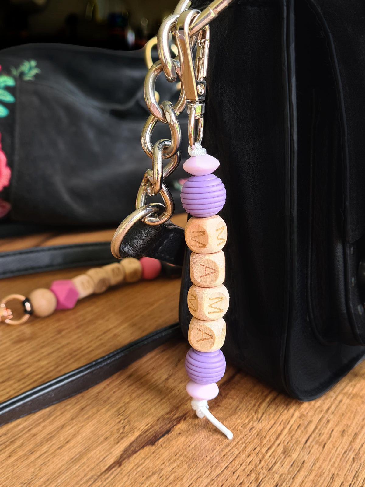 Hiya Mama keyring on a handbag, a baby shower gift