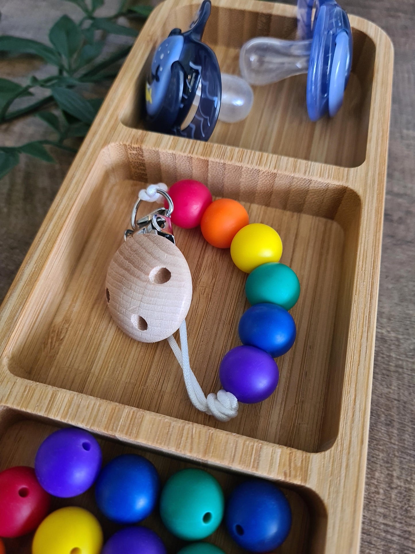Cute handmade soother clip. Unique gift ideas for newborns and toddlers. Handcrafted Irish made. Rainbow coloured clip.