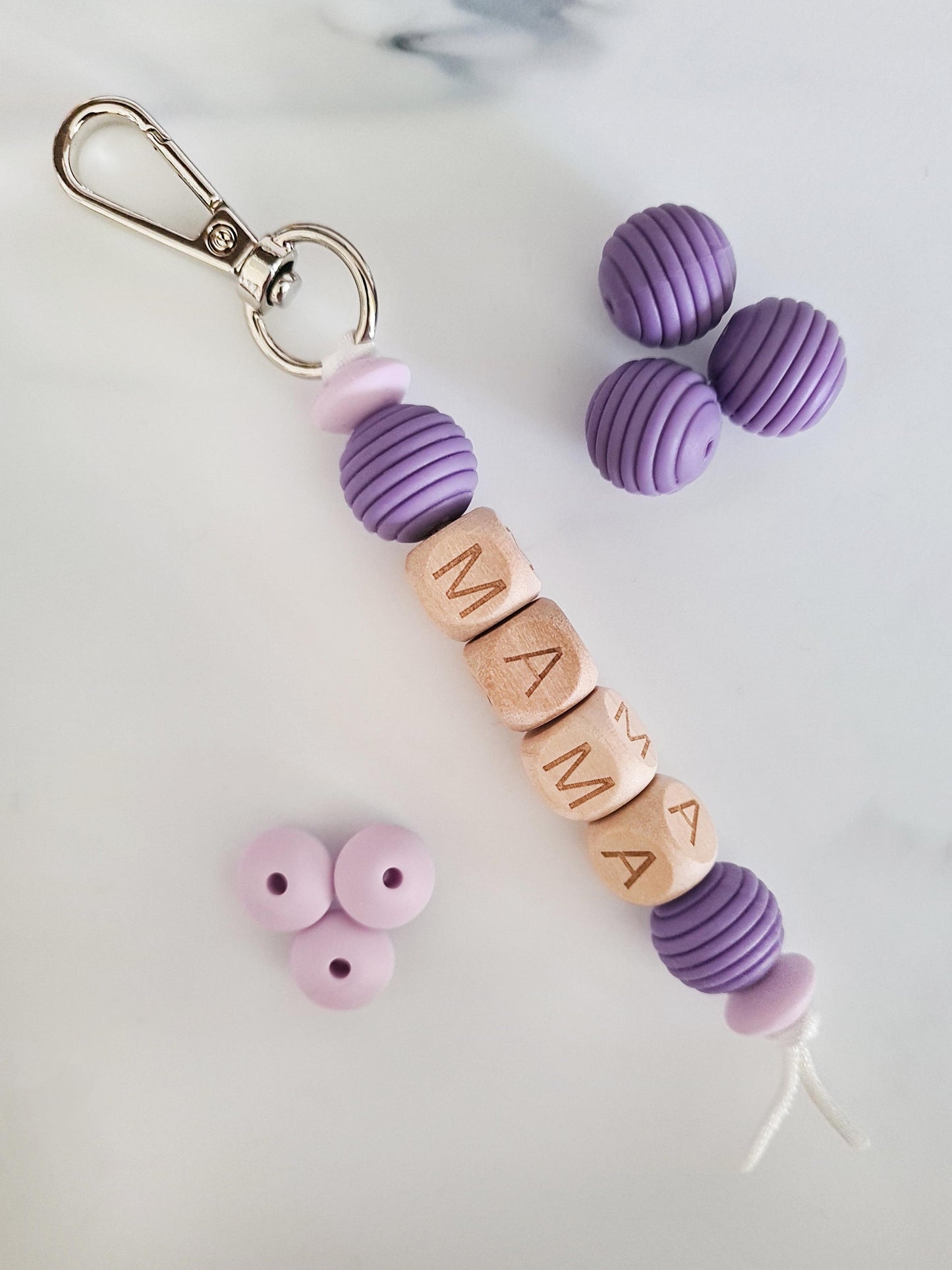 Hey Mama! Treat yo self to our unique handmade keychain / zip puller. Our keychains can be attached to handbags, baby changing bags, backpacks or as a keyring!