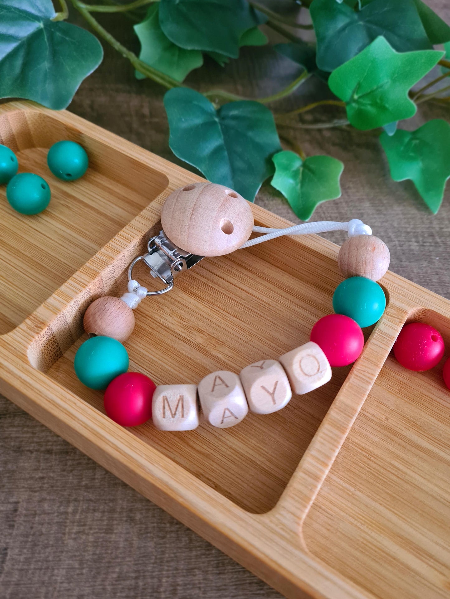 Cute handmade soother clips for the Mayo football GAA fans. Unique gift ideas for newborns and toddlers. Handcrafted Irish made. Features the Mayo colours.