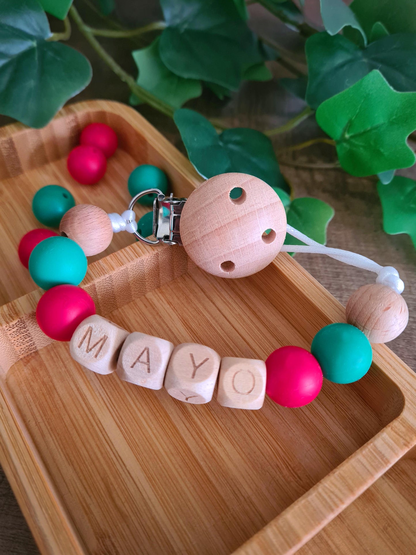 Cute handmade soother clips for the Mayo football GAA fans. Unique gift ideas for newborns and toddlers. Handcrafted Irish made. Features the Mayo colours.
