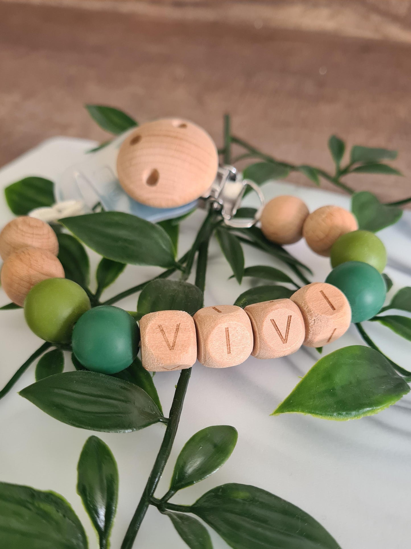 Personalised custom made soother clip. Add your Childs name to their dummy clip. Unique gift ideas for newborns and toddlers. Handcrafted Irish made.