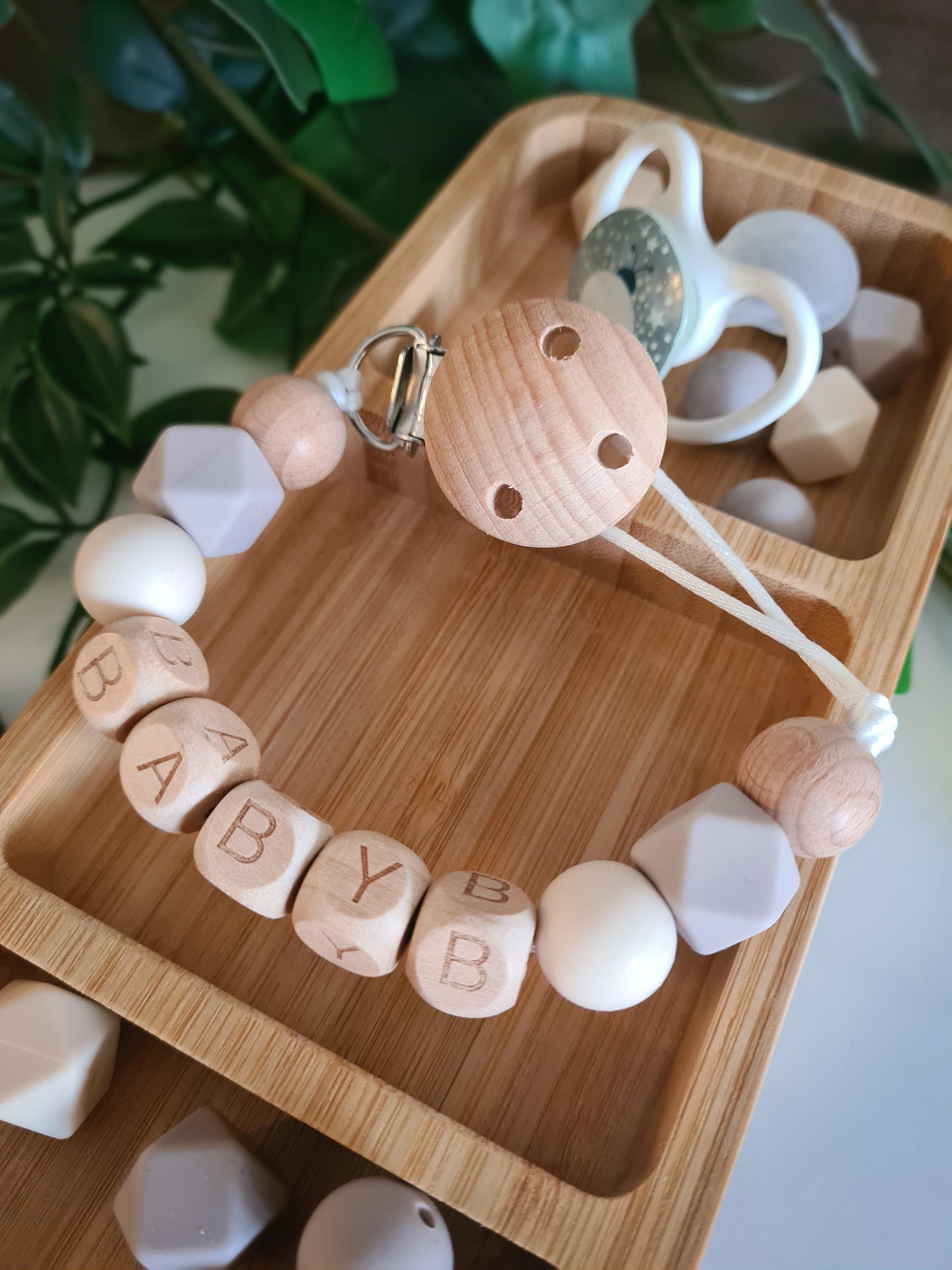 Personalised soother clips with name. Perfect as a Christening gift, a birthday gift or a gift for a newborn.