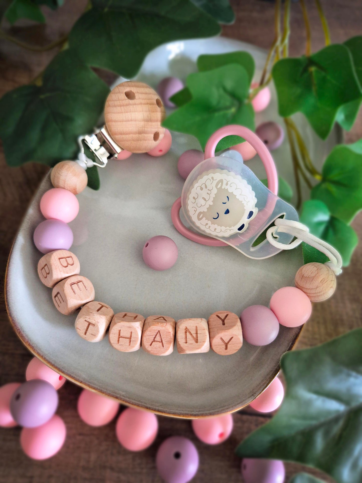 Personalised soother clips with name. Perfect as a Christening gift, a birthday gift or a gift for a newborn.