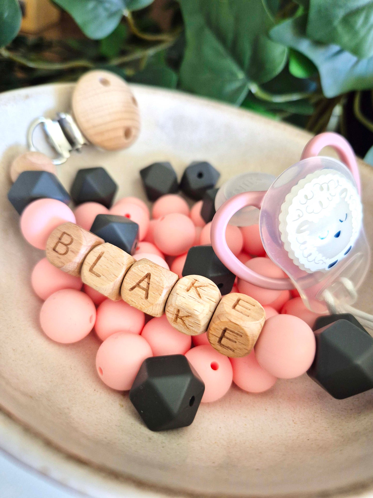 Personalised soother clips with name. Perfect as a Christening gift, a birthday gift or a gift for a newborn.