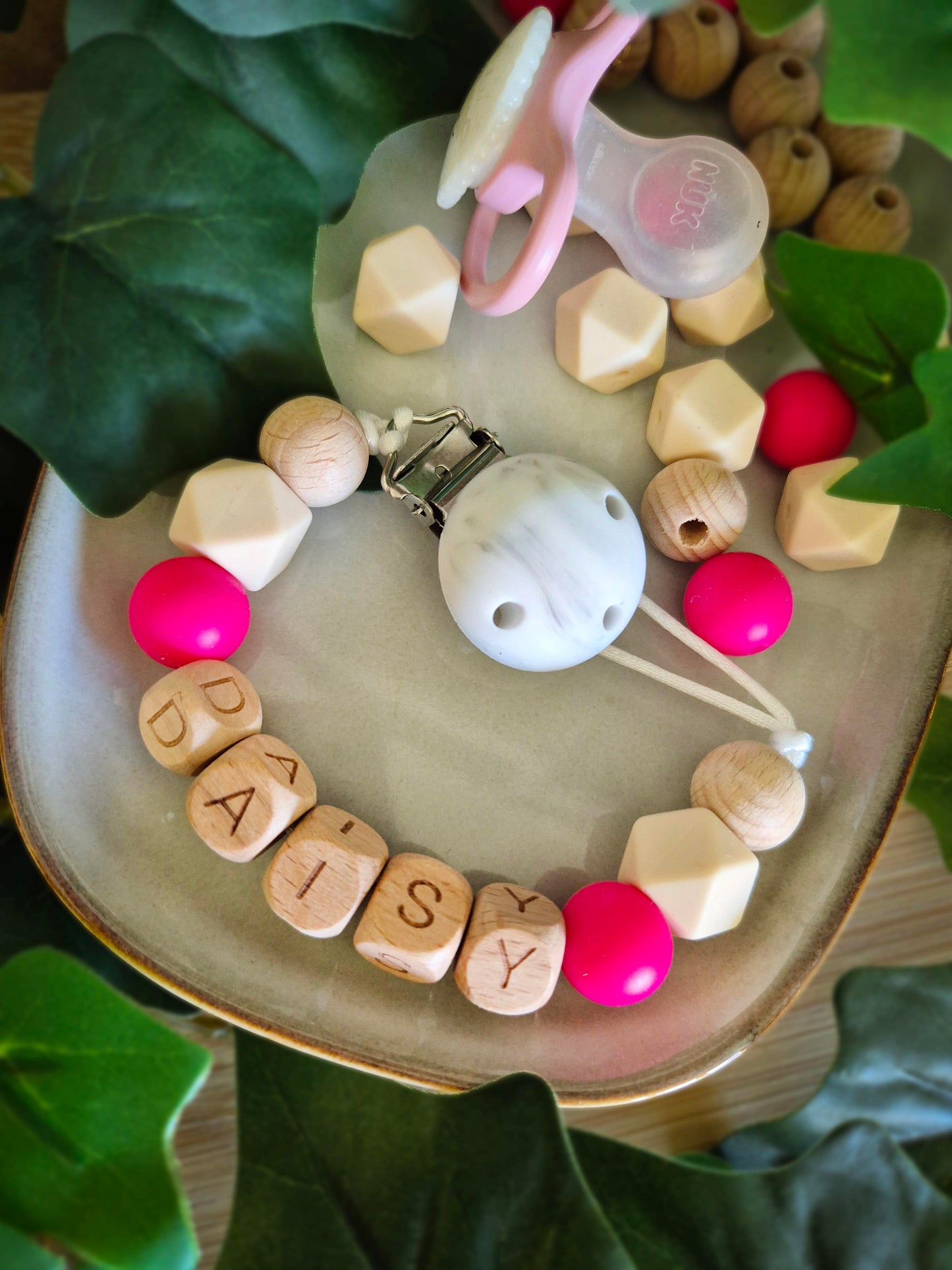 Personalised soother clips with name. Perfect as a Christening gift, a birthday gift or a gift for a newborn.