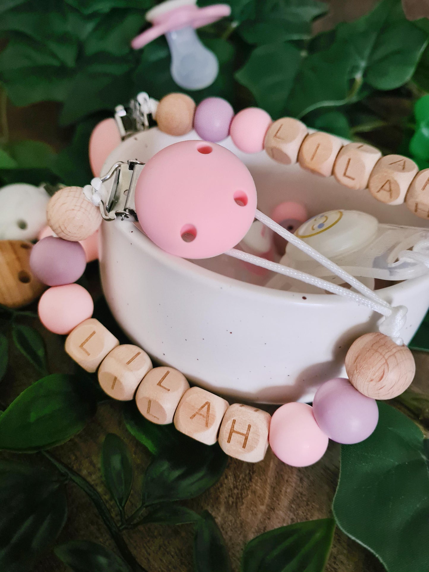 Personalised soother clips with name. Perfect as a Christening gift, a birthday gift or a gift for a newborn.