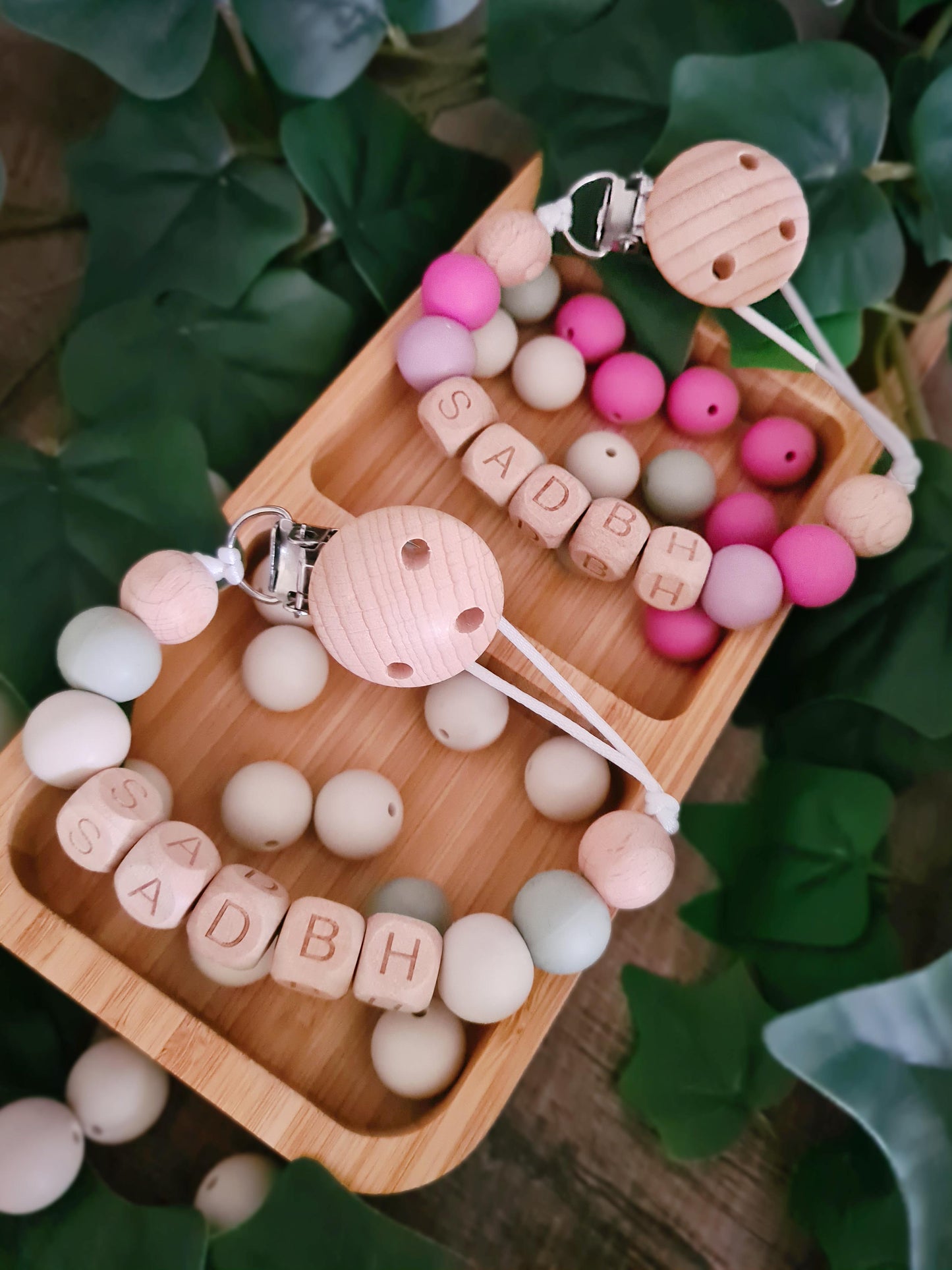 Personalised soother clips with name. Perfect as a Christening gift, a birthday gift or a gift for a newborn.