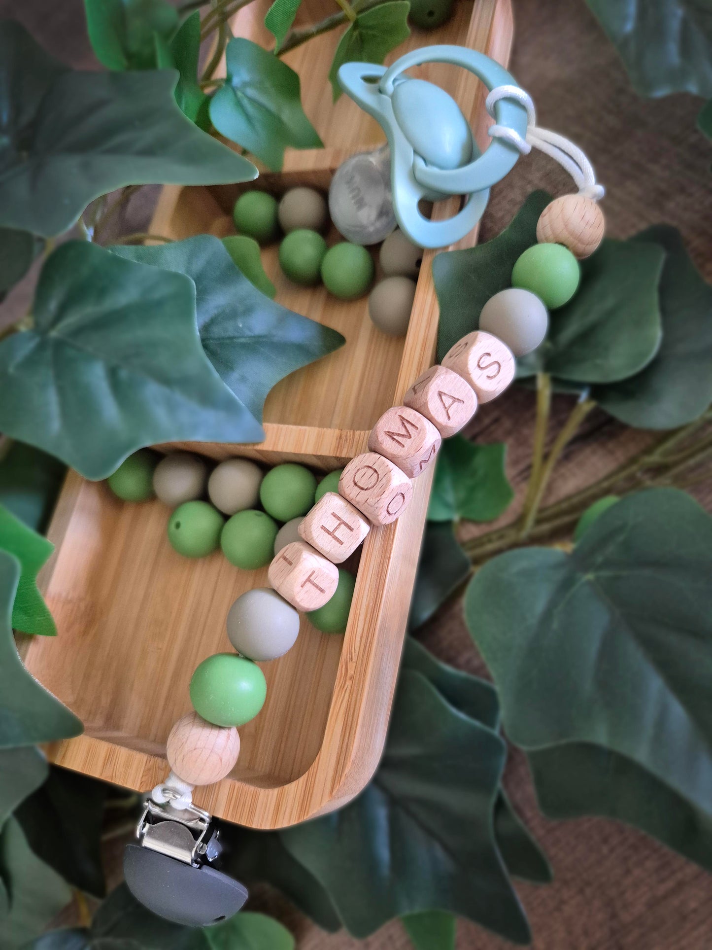 Personalised soother clips with name. Perfect as a Christening gift, a birthday gift or a gift for a newborn.