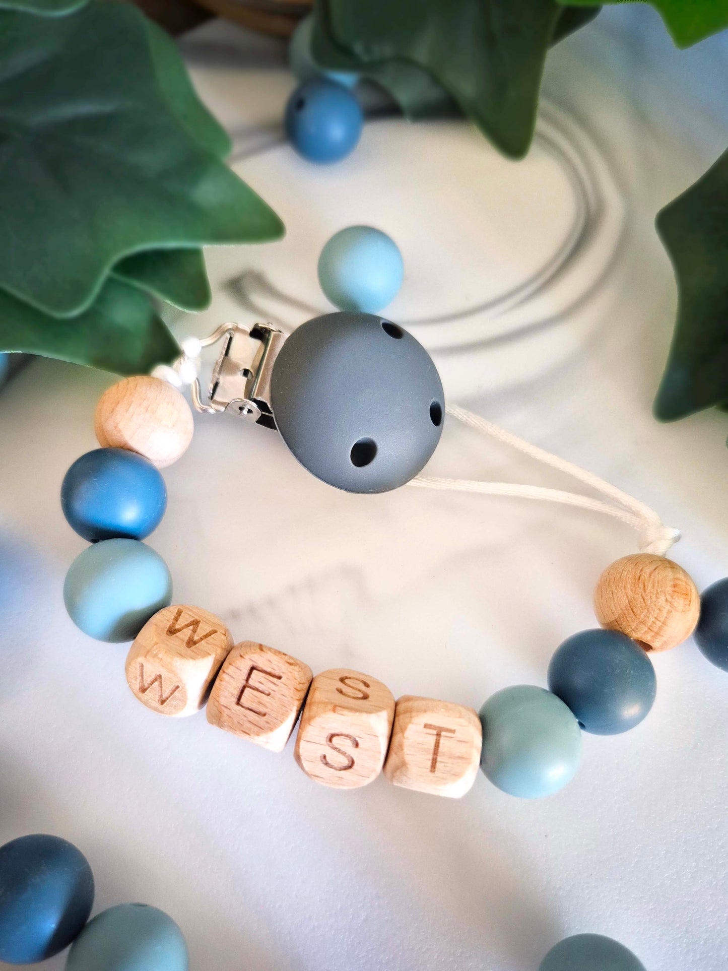 Personalised soother clips with name. Perfect as a Christening gift, a birthday gift or a gift for a newborn.