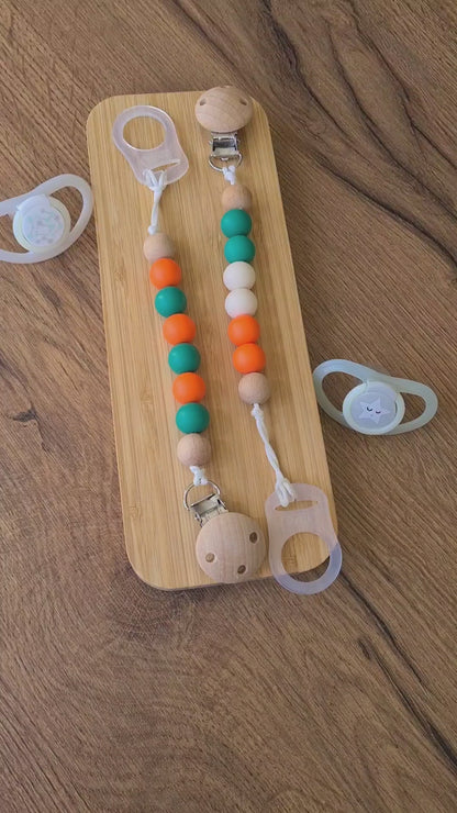 Cute handmade soother clips that display the colours of the Irish flag. A unique present for the newborns and toddlers of Ireland! 