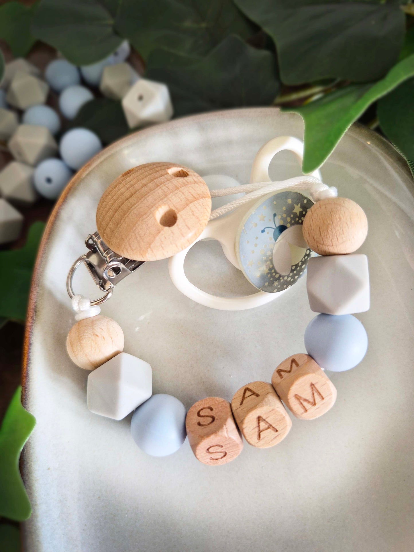 Personalised soother clips with name. Perfect as a Christening gift, a birthday gift or a gift for a newborn.