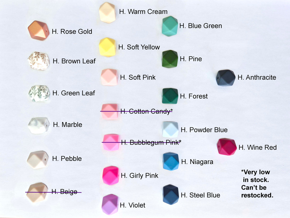 A color options chart showing multiple faceted gemstone or crystal shapes labeled with names like H. Rose Gold, H.