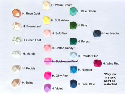 A color options chart showing multiple faceted gemstone or crystal shapes labeled with names like H. Rose Gold, H.