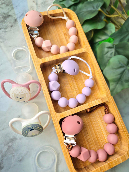 The perfect gift for newborns. Choose from 6 vibrant colours of the new personalised dummy clip range.
