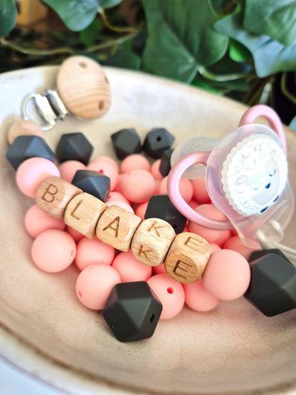 Personalised soother clips with name. Perfect as a Christening gift, a birthday gift or a gift for a newborn.