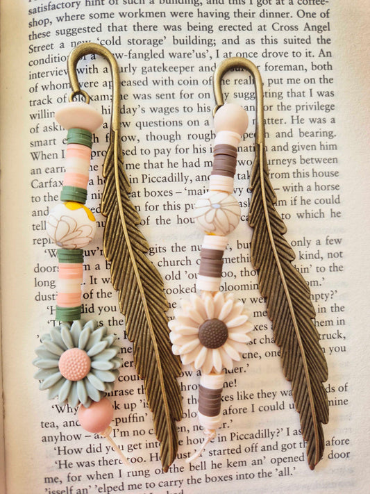 A lavish bronze feathered bookmark. The perfect gift for yourself, or for that special book lover in your life!