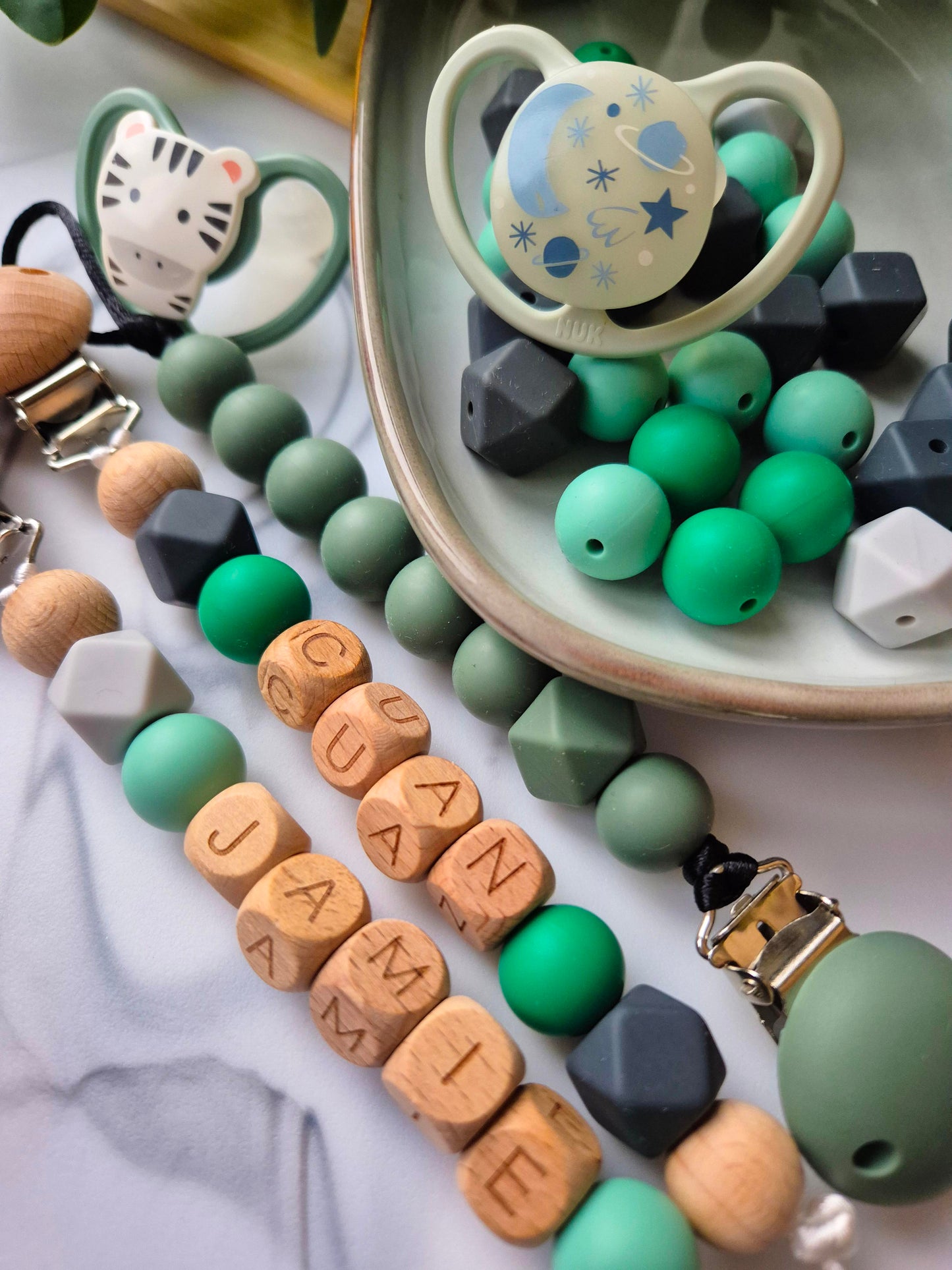 Personalised soother clips with name. Perfect as a Christening gift, a birthday gift or a gift for a newborn.