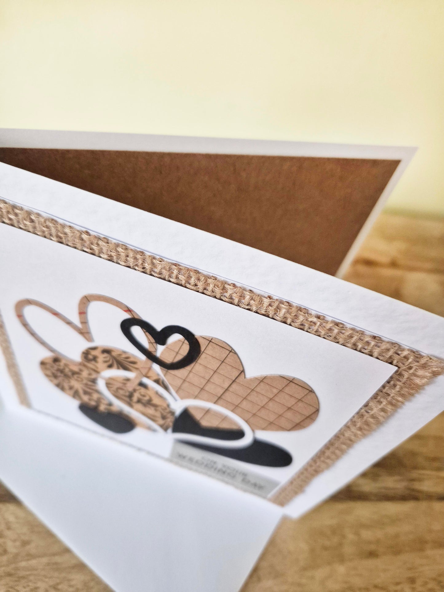 Handcrafted card full of hearts. Kraft, black and white colour theme. Suitable for Wedding Day or Valentine's Day
