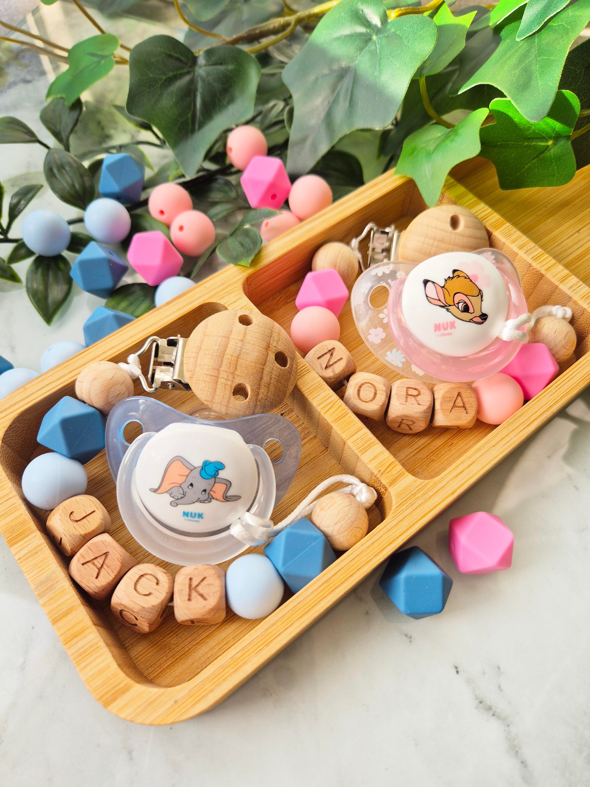 Personalised soother clips with name. Perfect as a Christening gift, a birthday gift or a gift for a newborn.