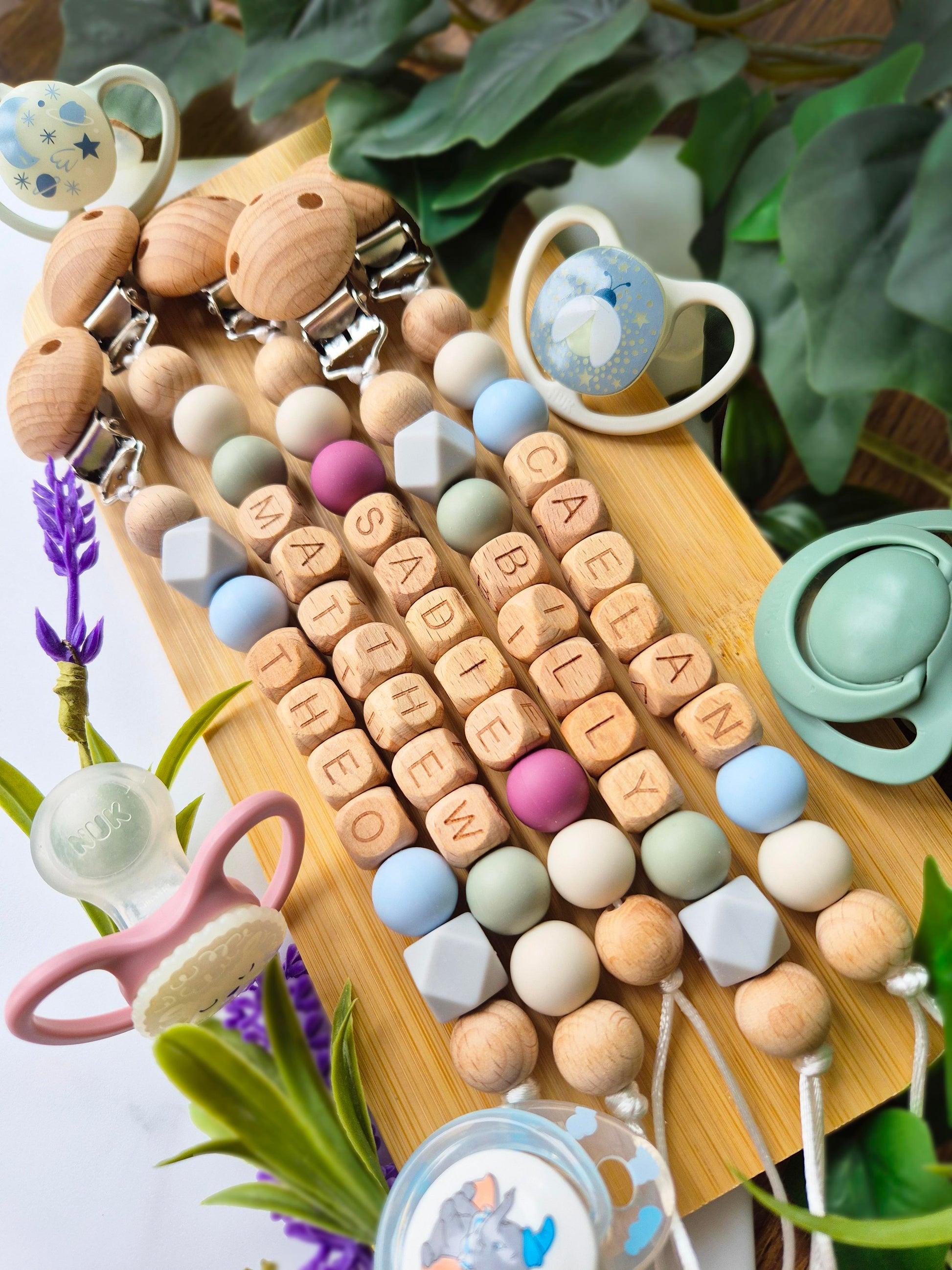 Personalised soother clips with name. Perfect as a Christening gift, a birthday gift or a gift for a newborn.