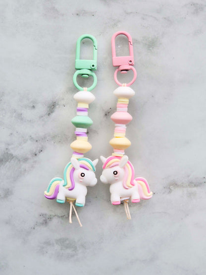 Handmade pastel unicorn beaded keychain zip puller in light pink and mint green